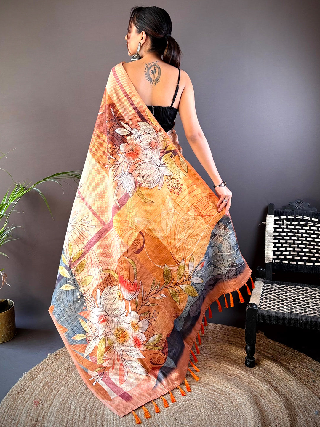 Back view of Light Orange Semi Zari Tussar Floral Saree