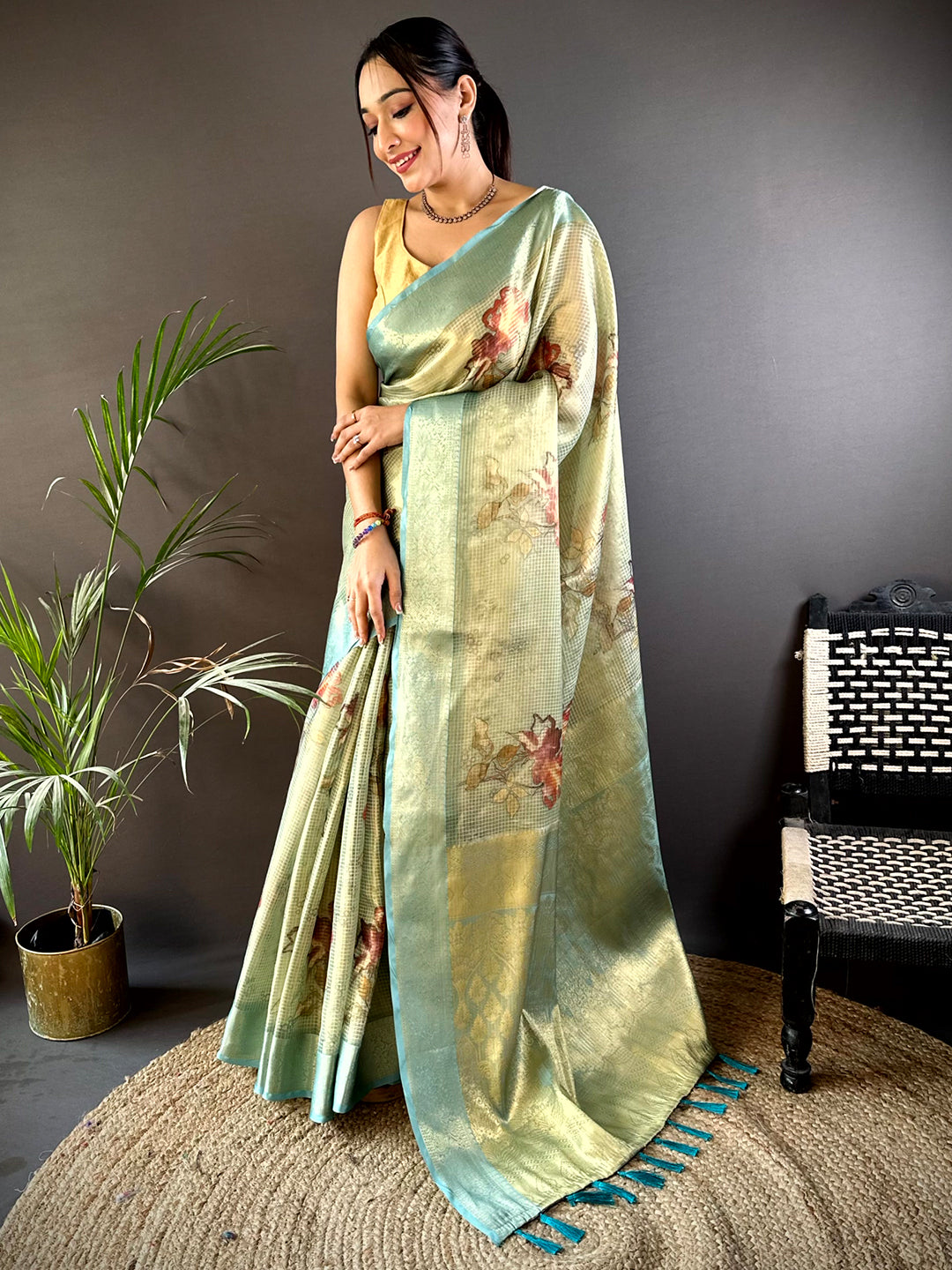 Stylish Green Self Gold Zari Floral Print Saree