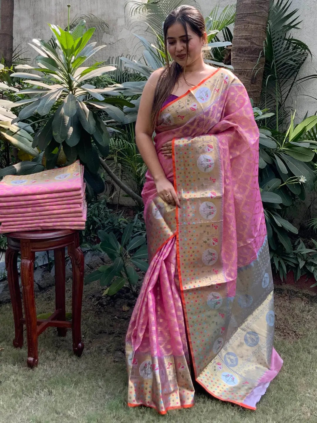 Elegant pink Kota Doria silk saree with detailed Minakari work