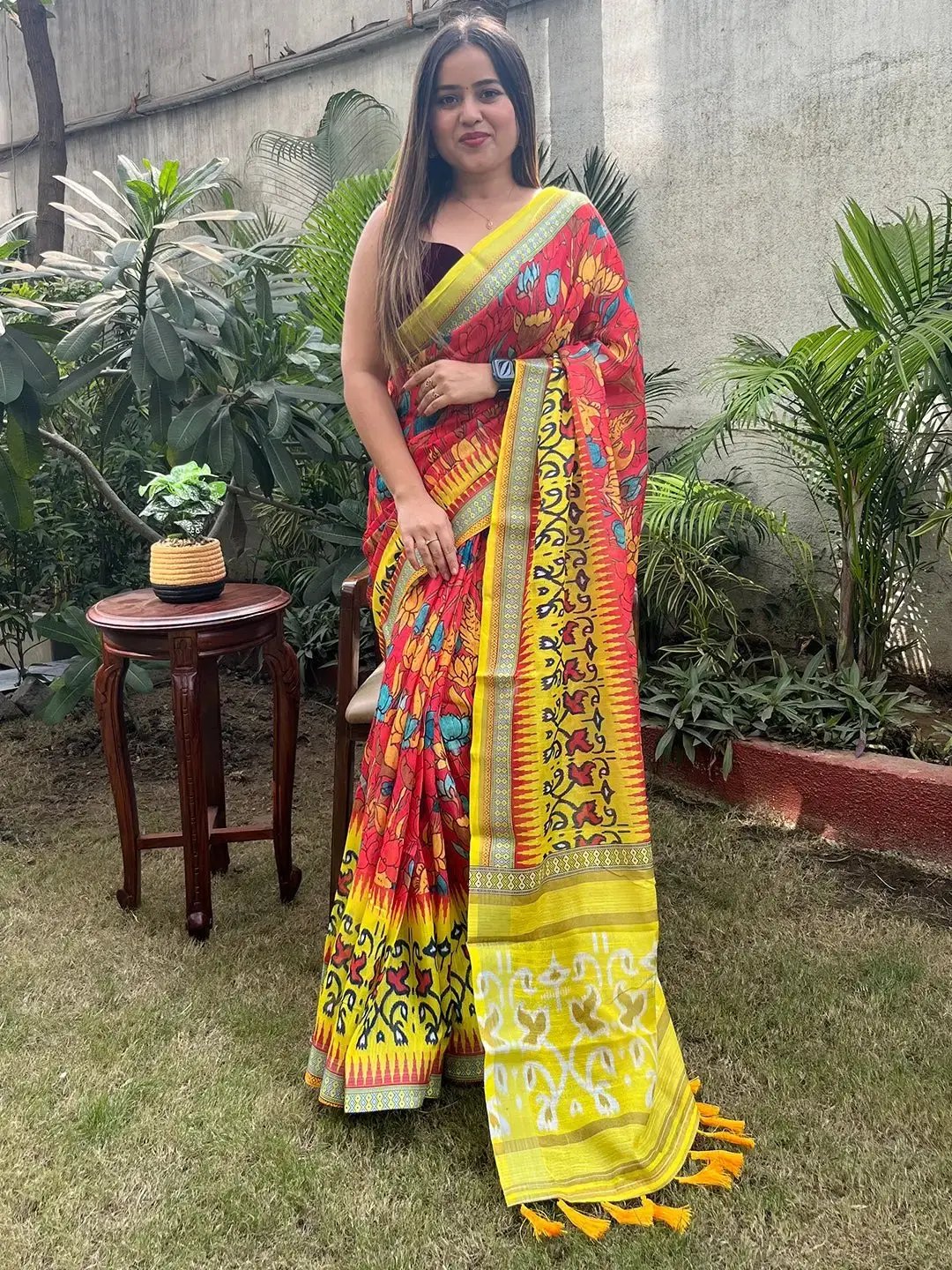 Elegant party wear saree with floral Ikkat design