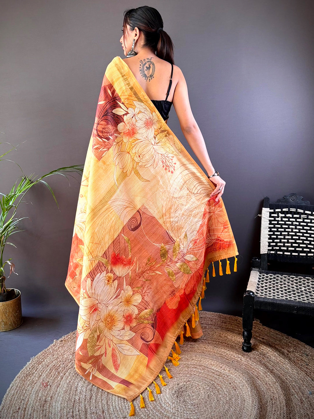 Back view of Golden Yellow Semi Zari Tussar Floral Saree