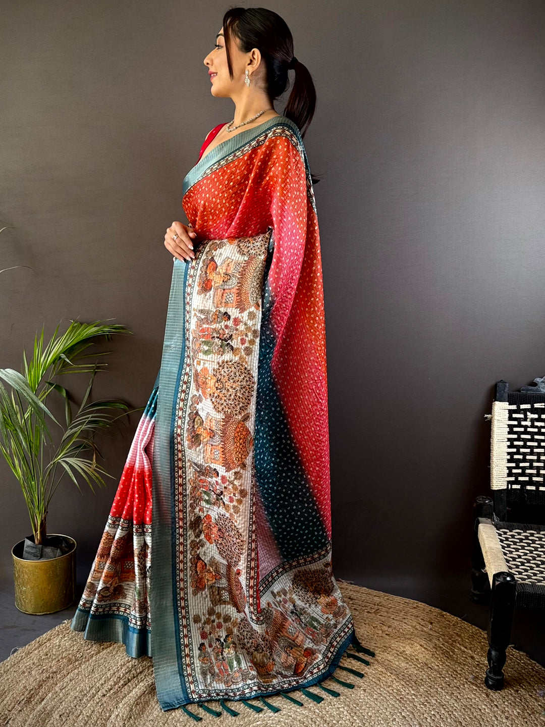 Side profile of Radiant Silk Blend Bandhani Print Saree highlighting its intricate border and vibrant design. Perfect for weddings and special occasions.