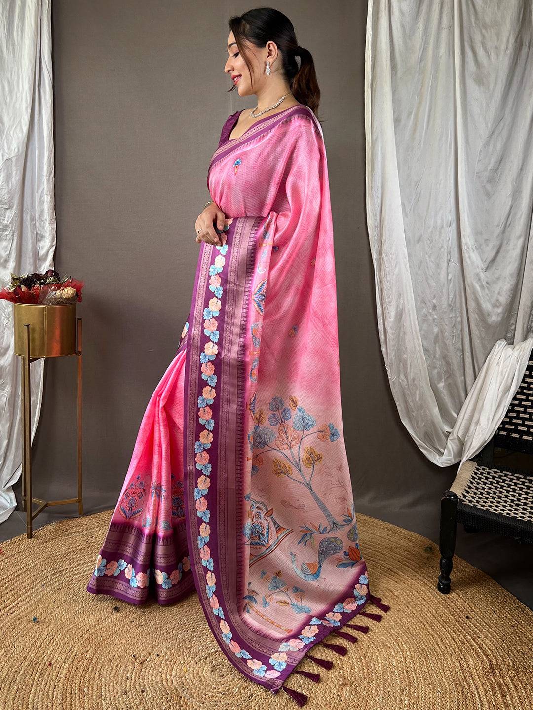 Stylish pink Kota saree with intricate satin border and floral details.