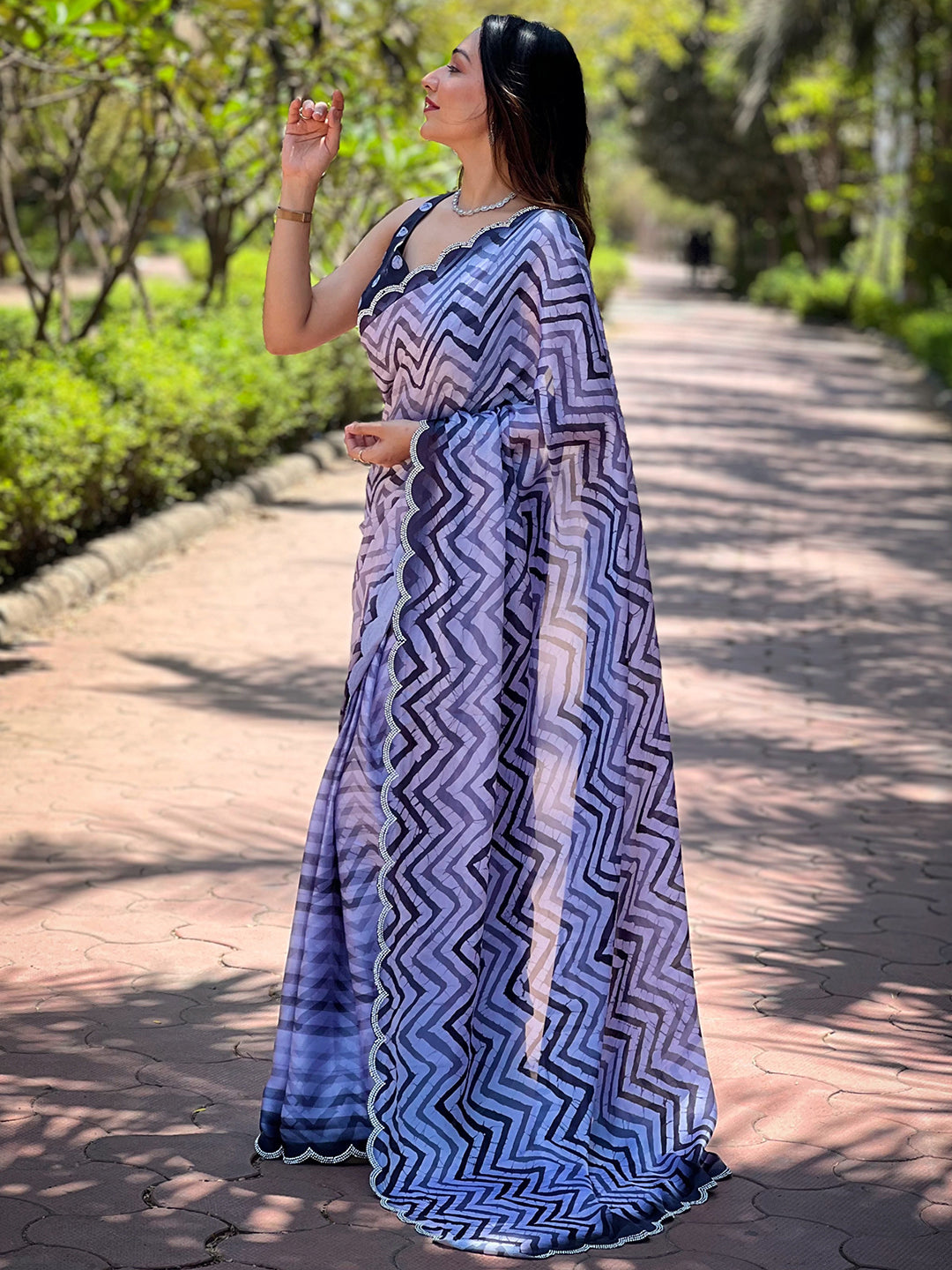 Beautiful Leheriya And Striped Print Saree