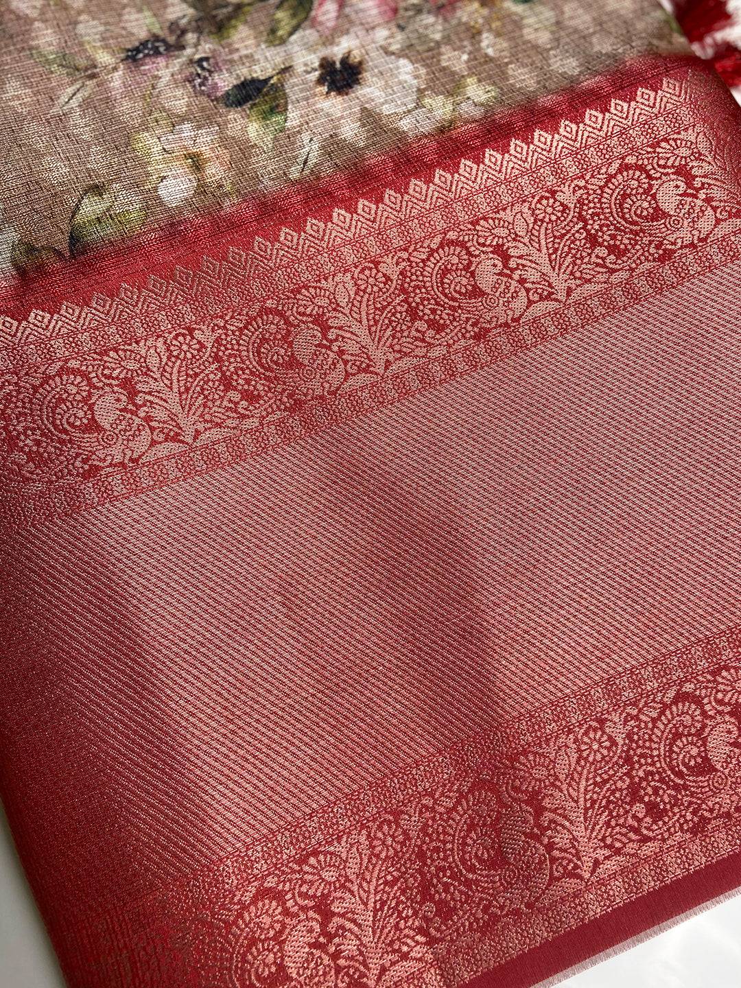 Close-up of floral print saree with red Kanjivaram border