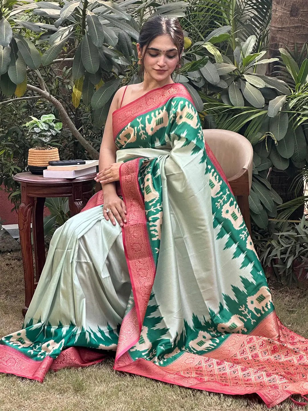 Stylish Banarasi soft silk saree adorned with Zari Patola pallu