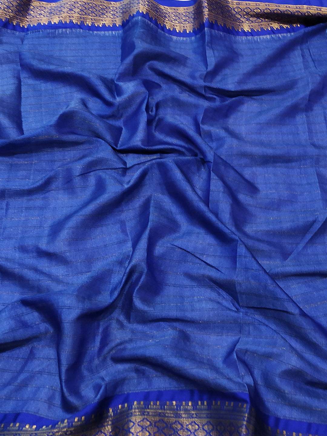 Rich blue Uppada silk fabric with detailed border design