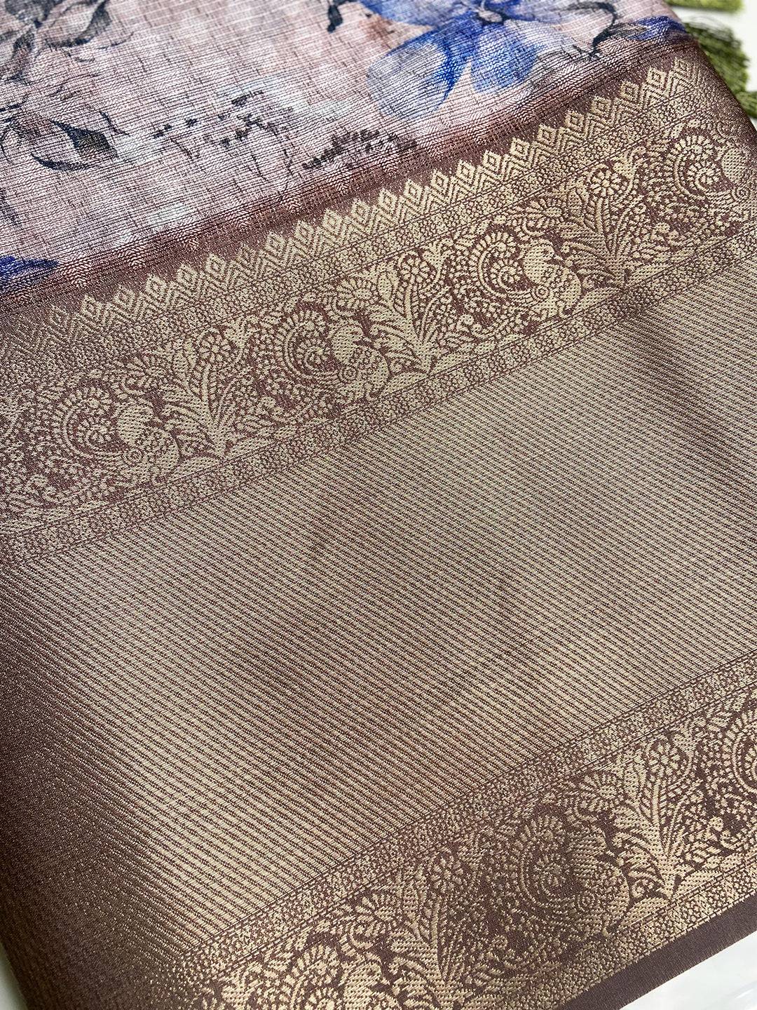 Detailed view of gold zari border on light pink saree