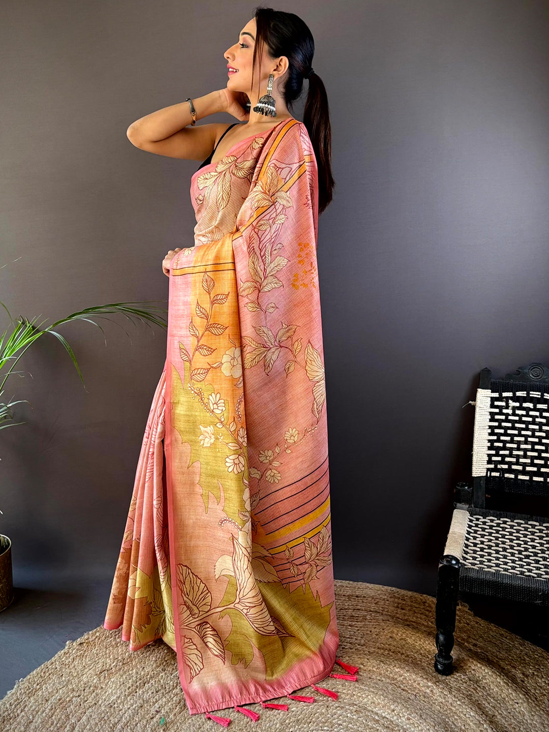 Side view of pink abstract floral zari tussar saree