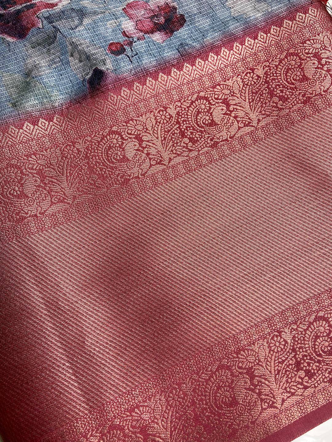 Pink gold zari border on sky blue floral print saree