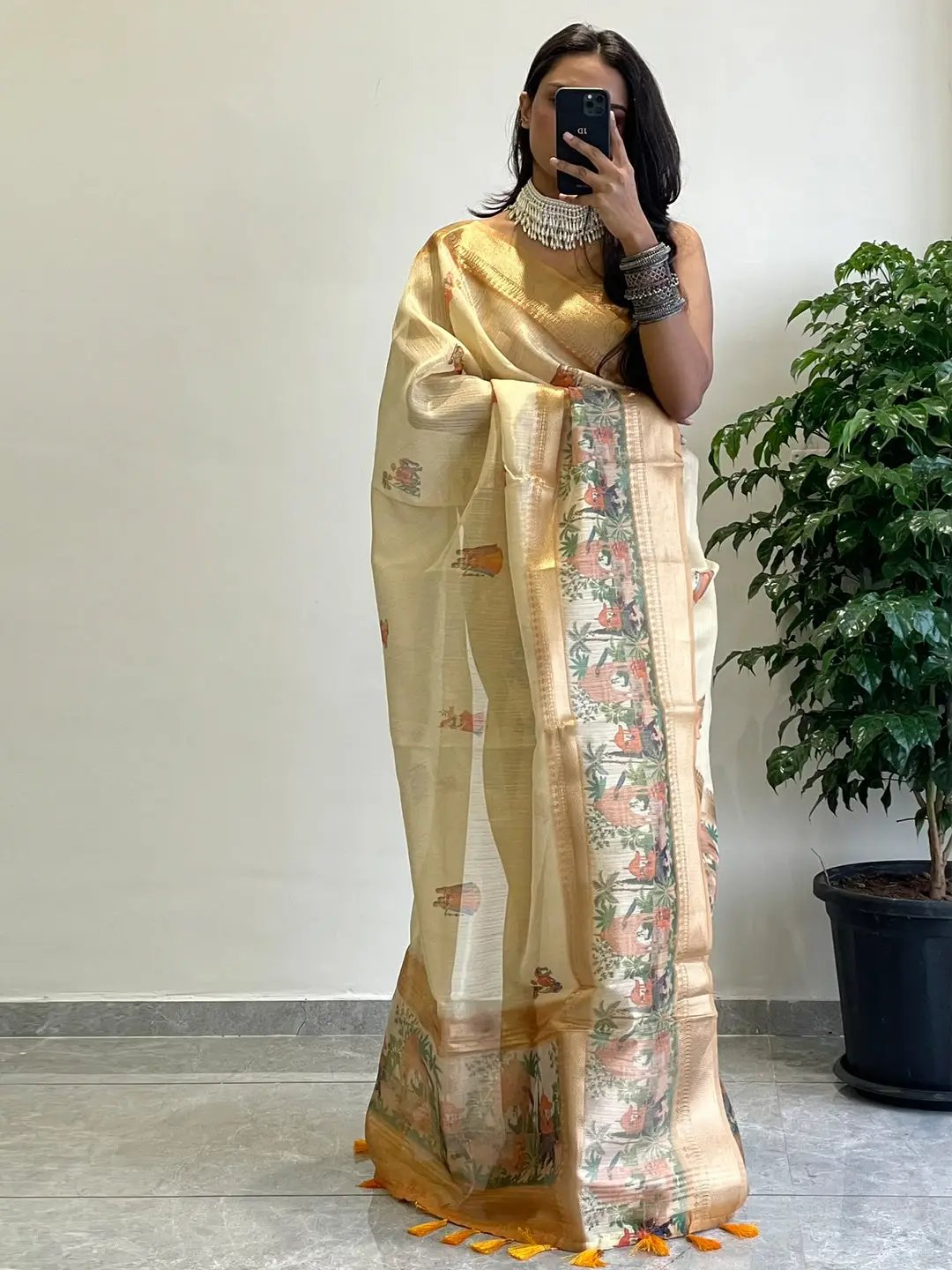 Elegant Gold Zari Tissue Saree with Traditional Print