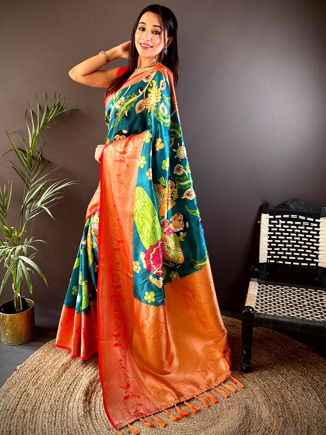 Traditional Rama soft silk saree with intricate Kalamkari print.