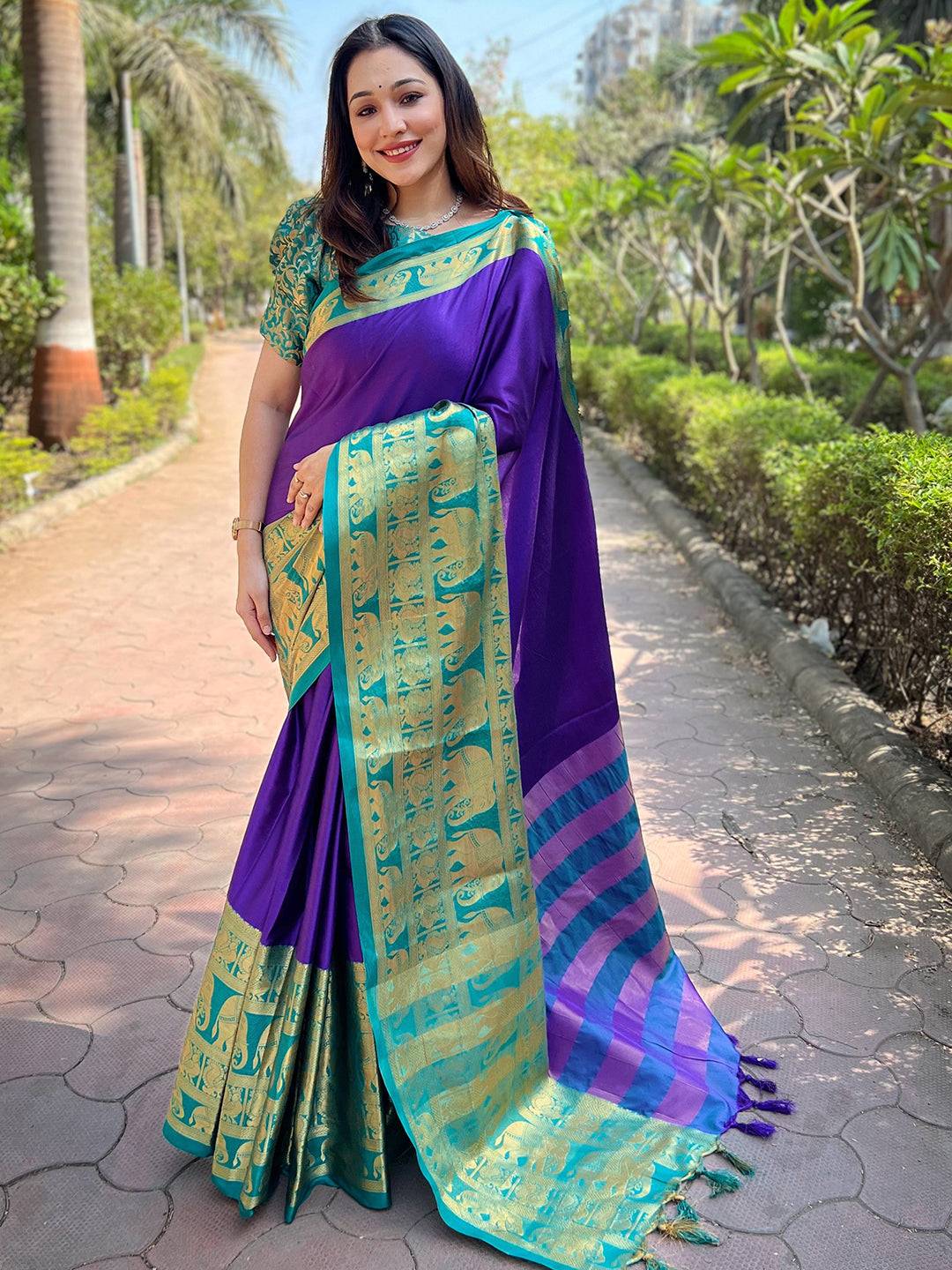 Full view of indigo Kanjivaram saree with intricate gold design