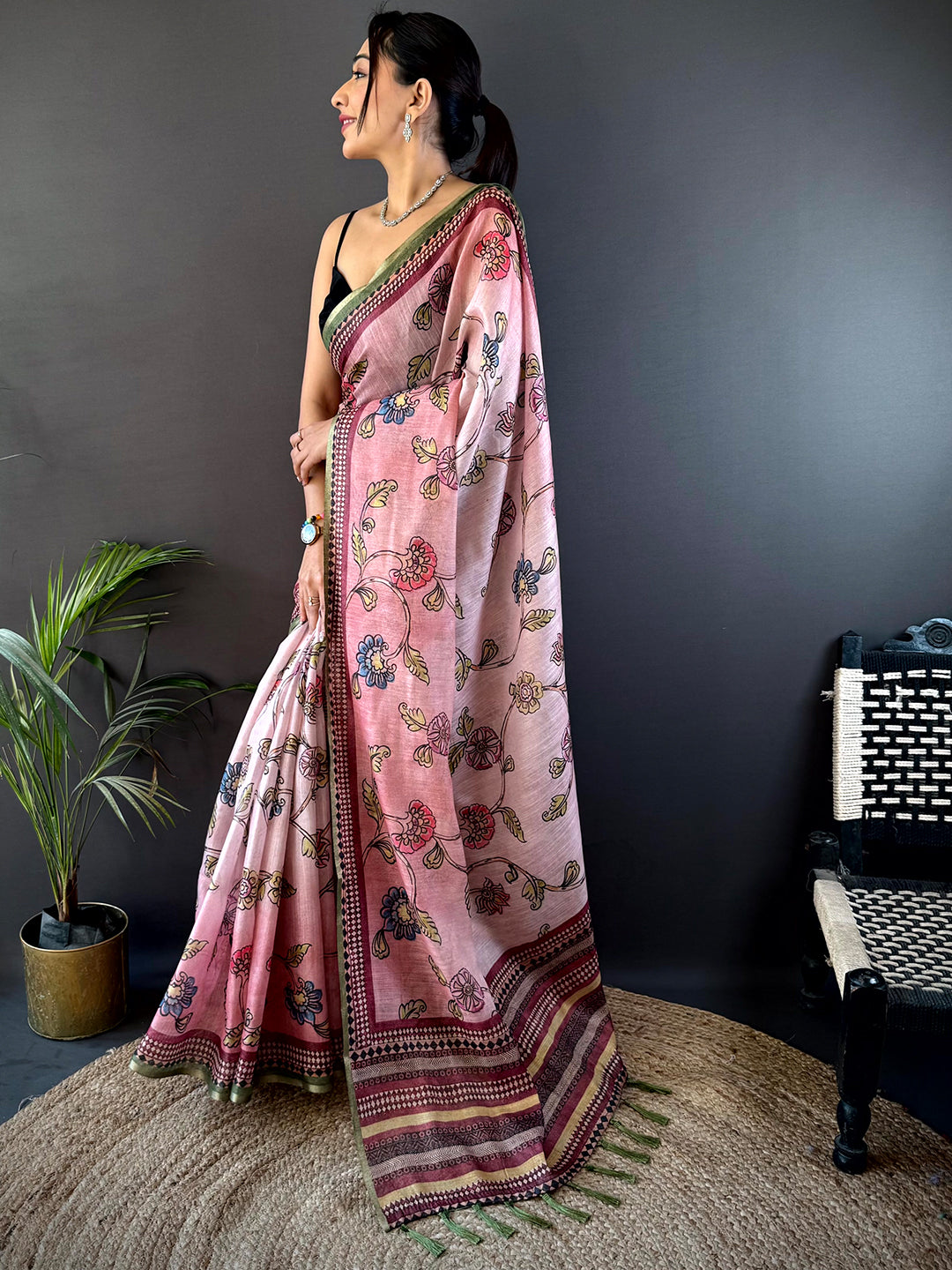 Elegant Rose Pink Zari Tussar Floral Saree with intricate floral designs and a contrasting border, ideal for weddings and festive gatherings.