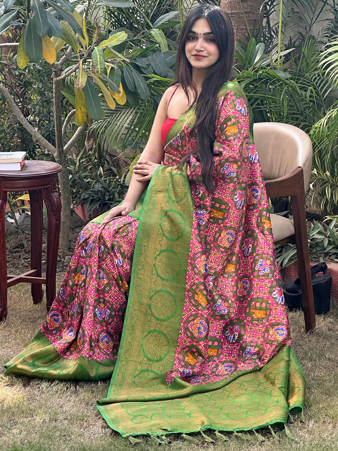 Traditional Dola silk saree with rich zari patterns