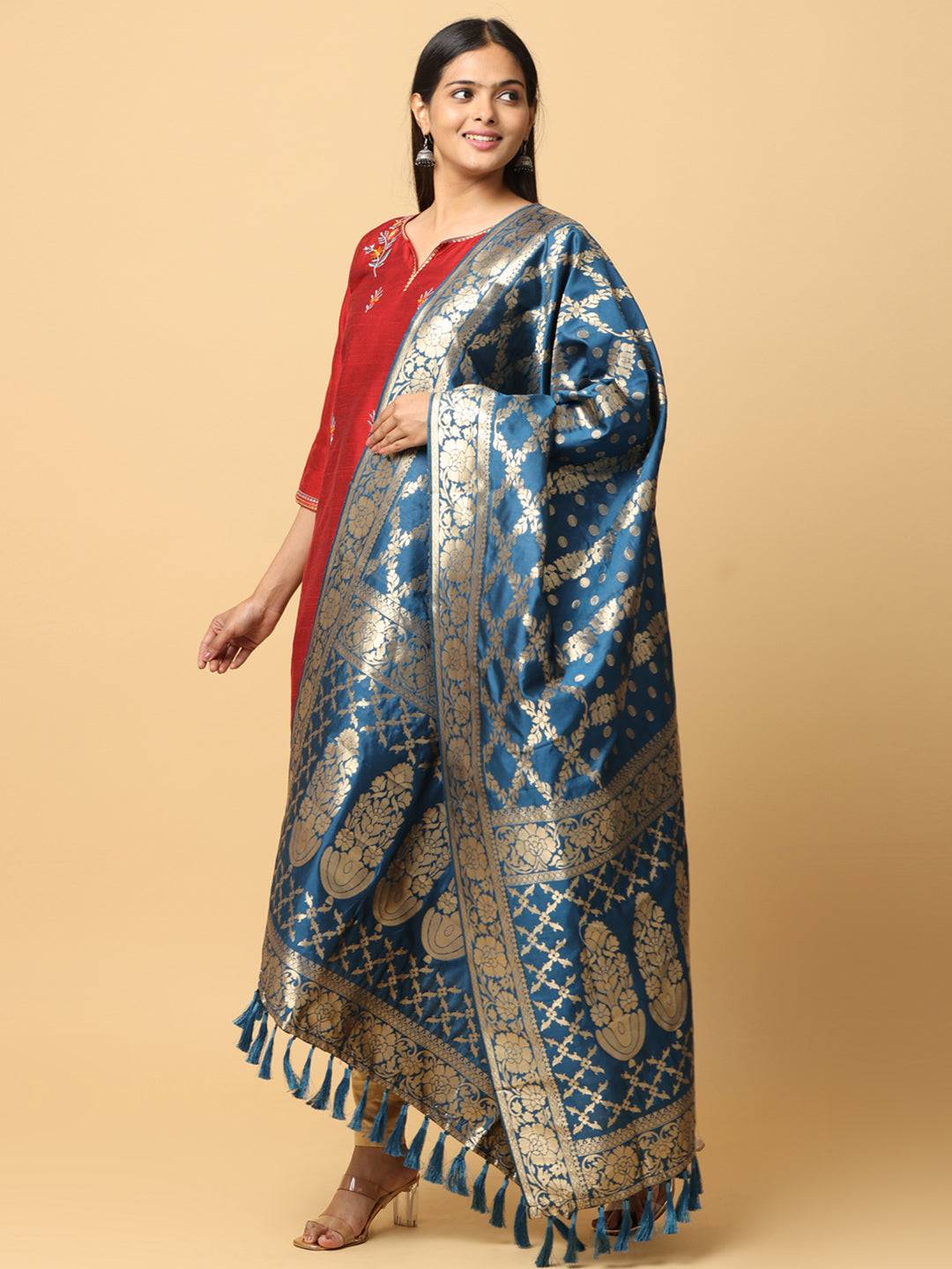 Model showcasing silk blend woven dupatta with resham tassels.