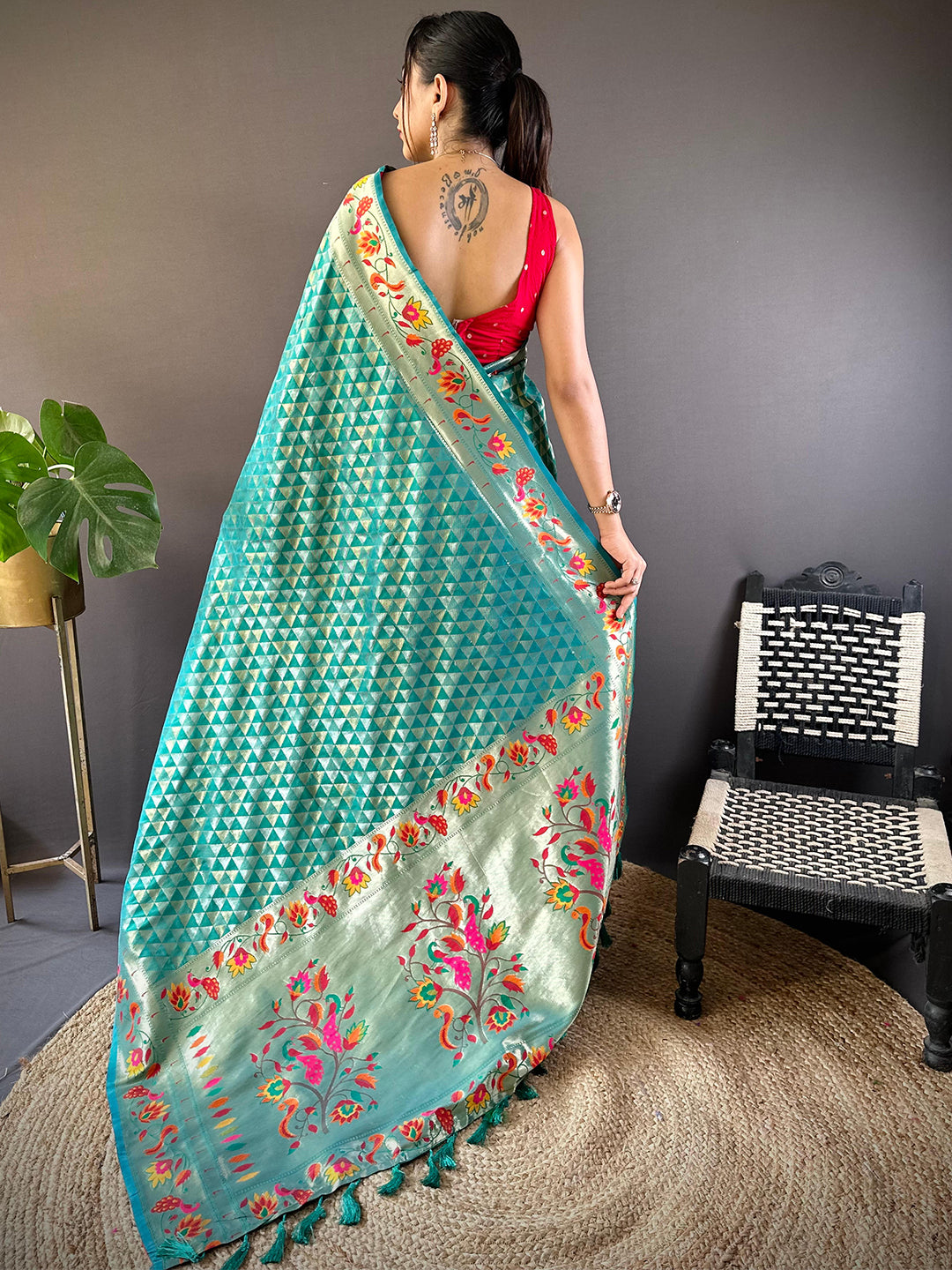 Back view of Rama silk Paithani saree with intricate zari