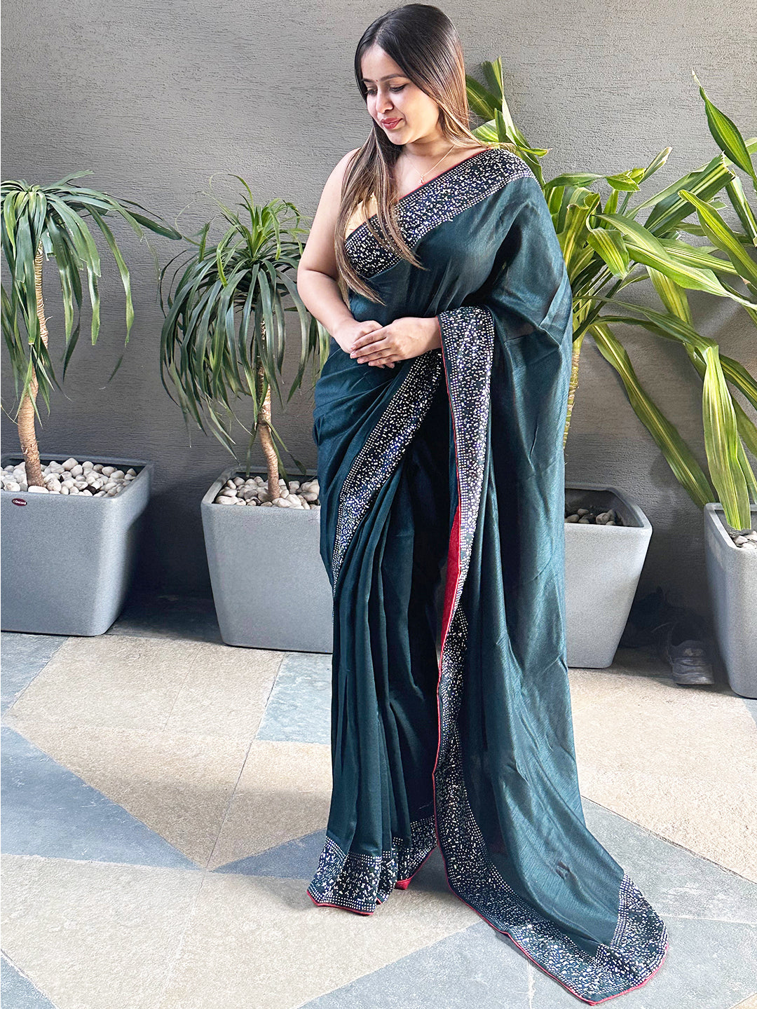 Elegant dark green Vichitra silk saree with Swarovski stones