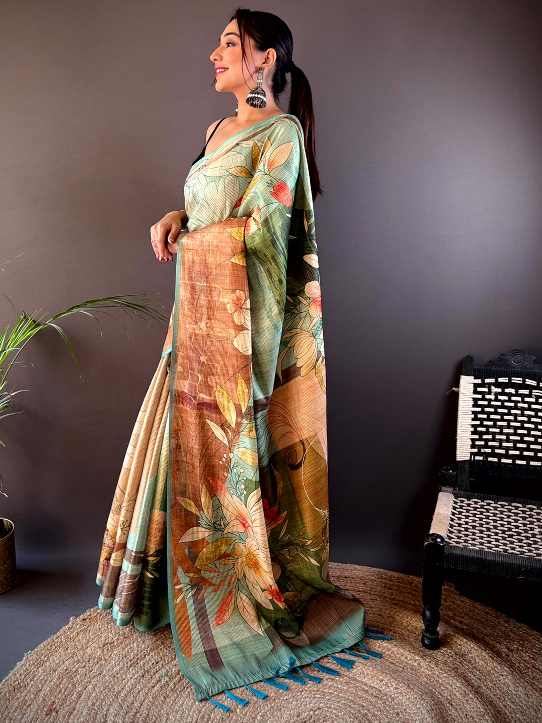 Side view of Rama Blue Zari Tussar Saree with floral motifs