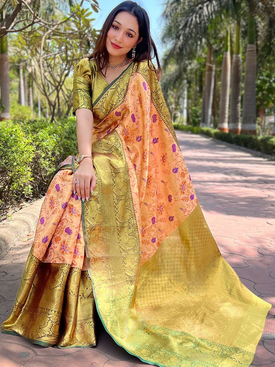 Festive orange Banarasi saree with detailed gold border