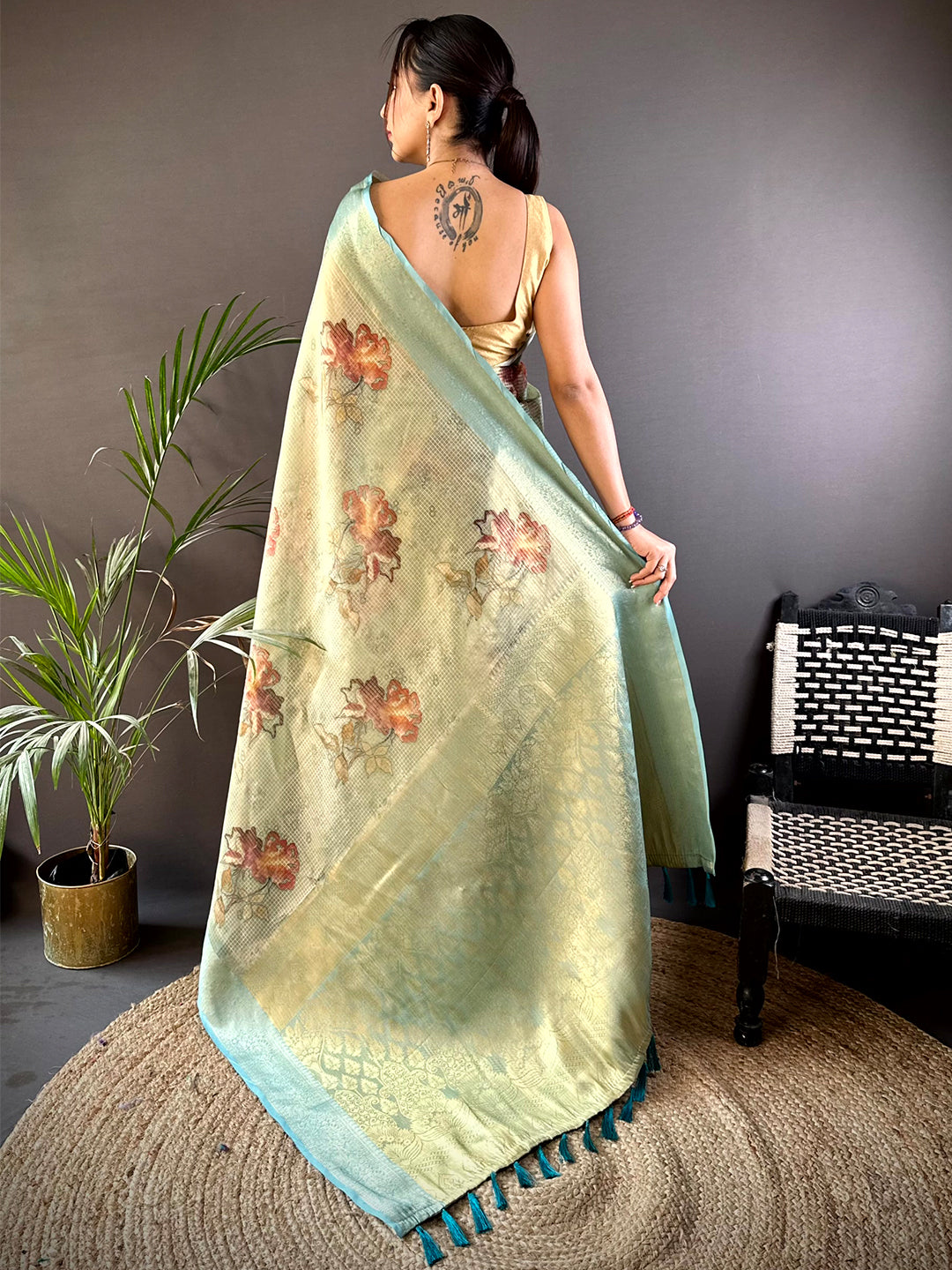 Stylish Green Self Gold Zari Floral Print Saree