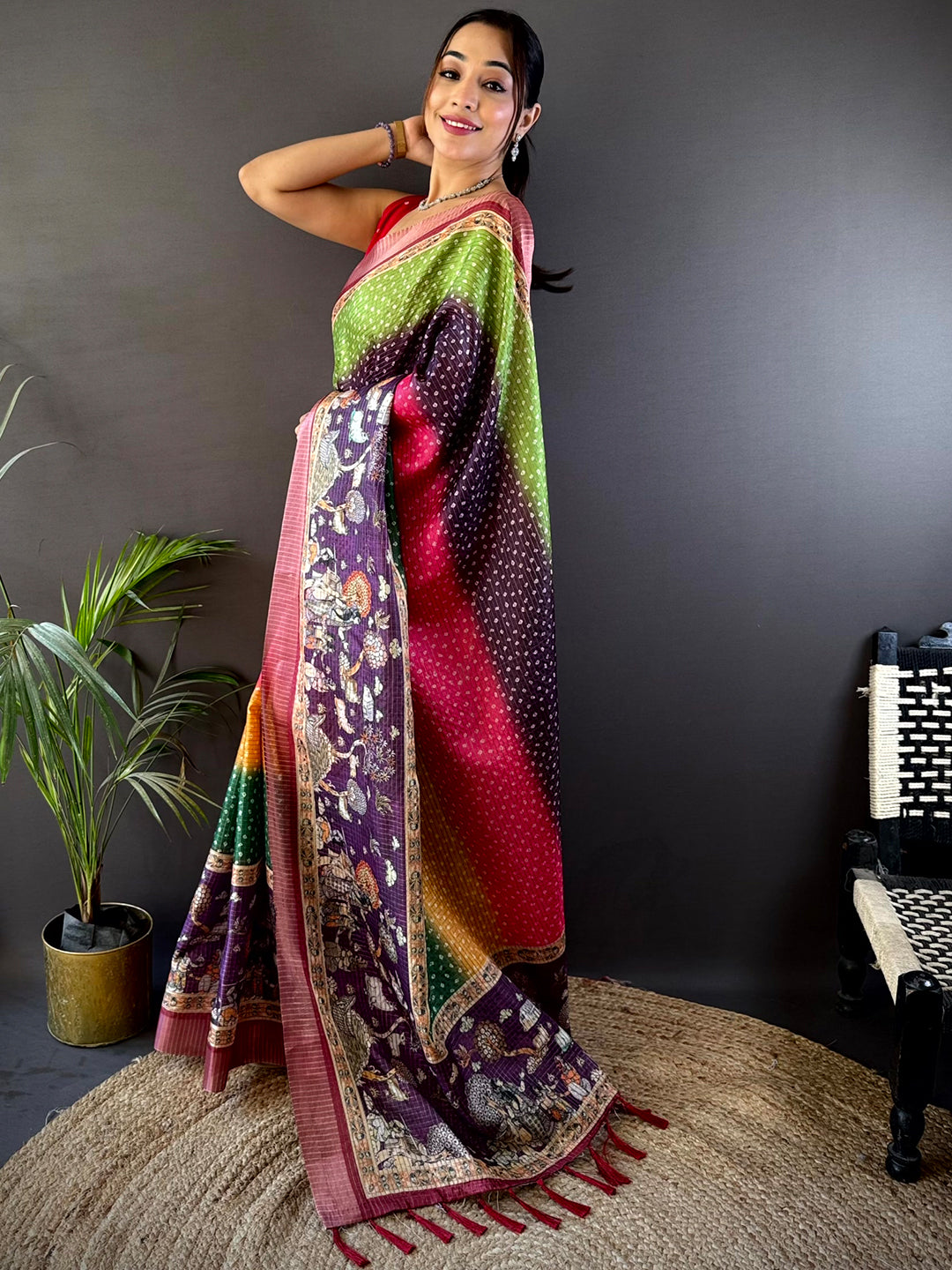 Graceful Bandhani Print Silk Saree in vibrant shades, adorned with tassel detailing, making it a stunning addition to any ethnic wardrobe.