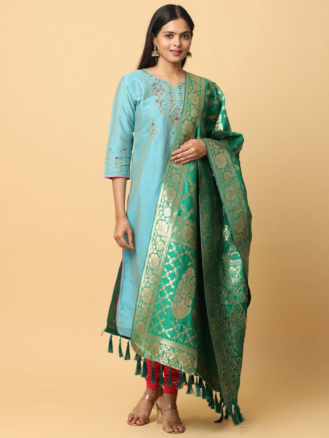 Model wearing green silk blend dupatta with detailed woven design