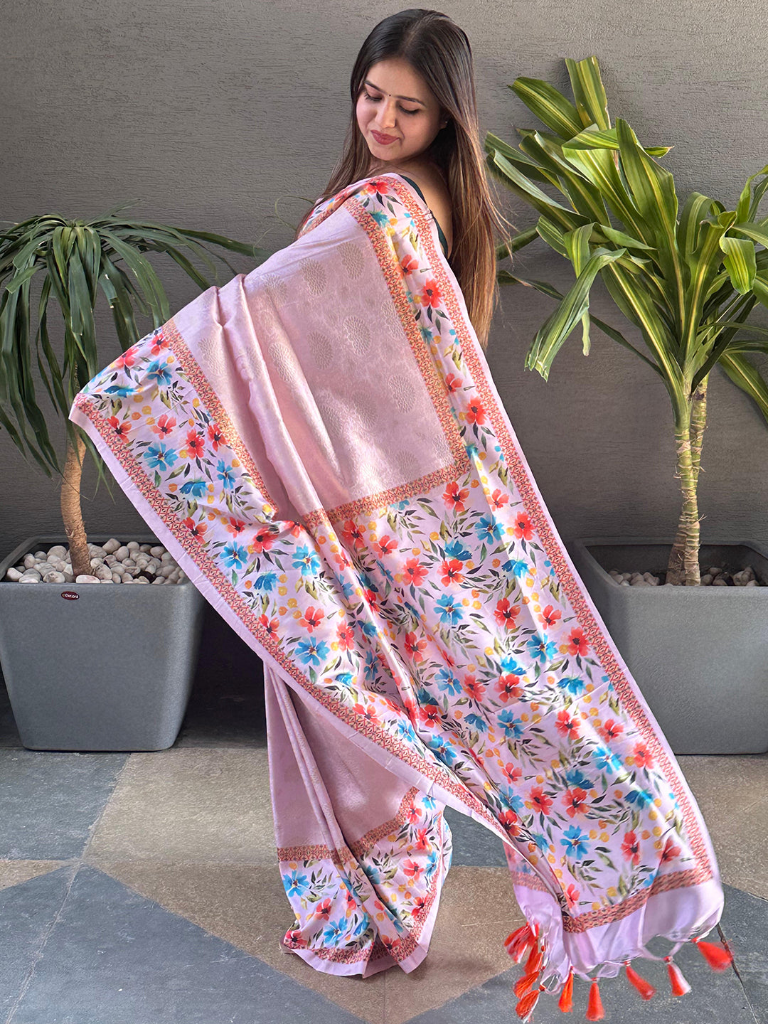 Light pink Kanjivaram saree with floral print, side view