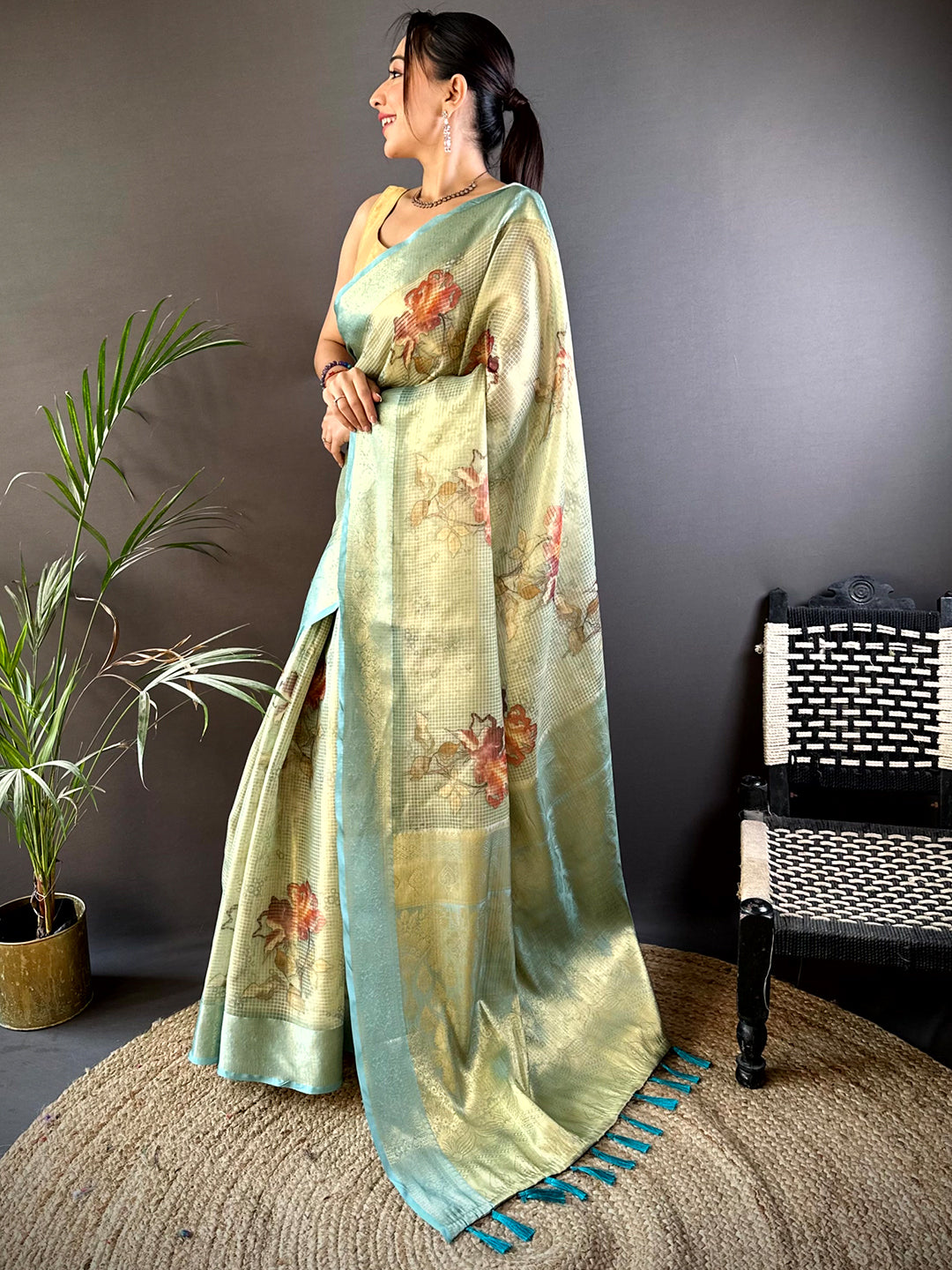 Stylish Green Self Gold Zari Floral Print Saree