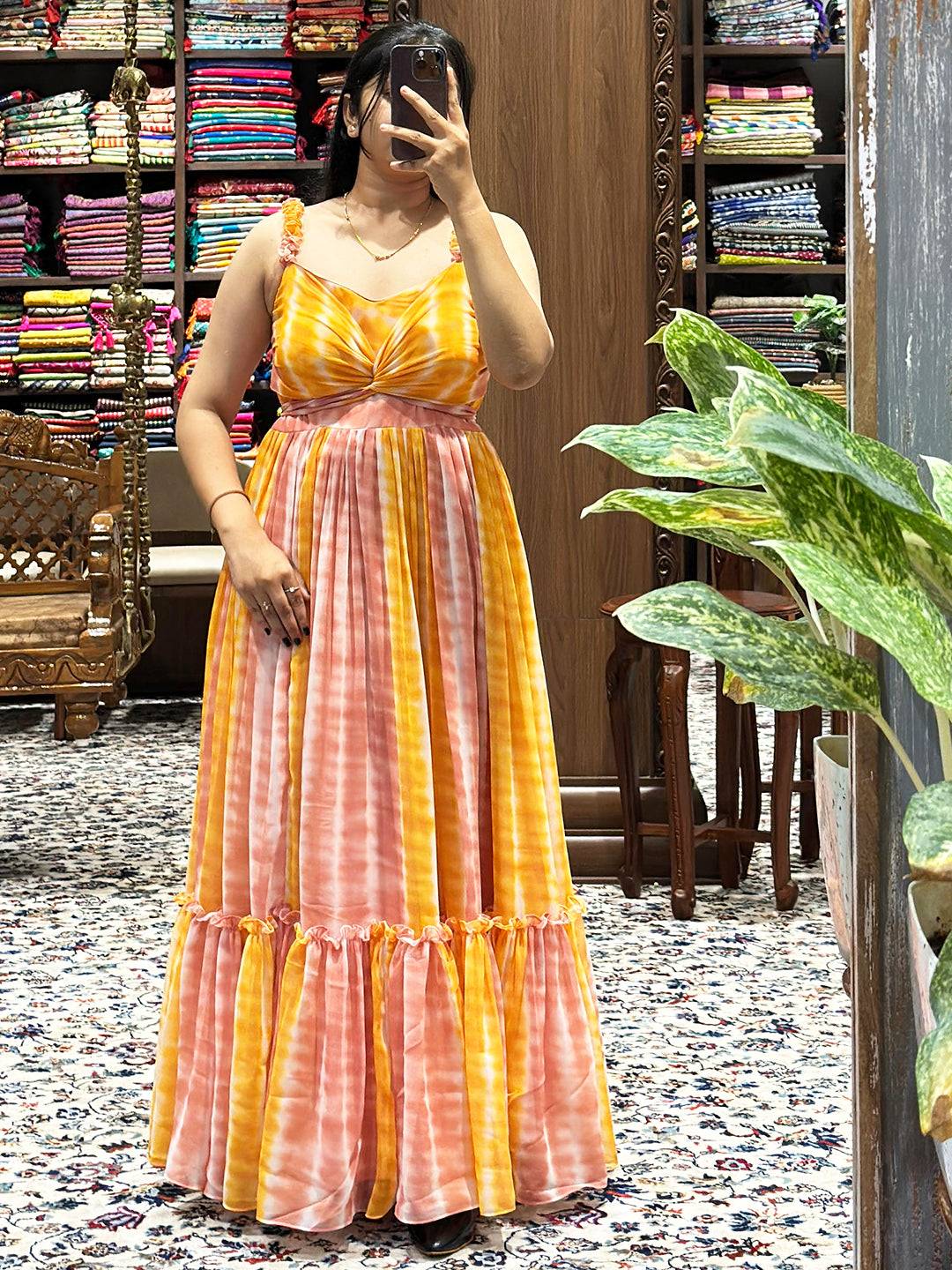 Model wearing Daisy Yellow Batik Print Dress