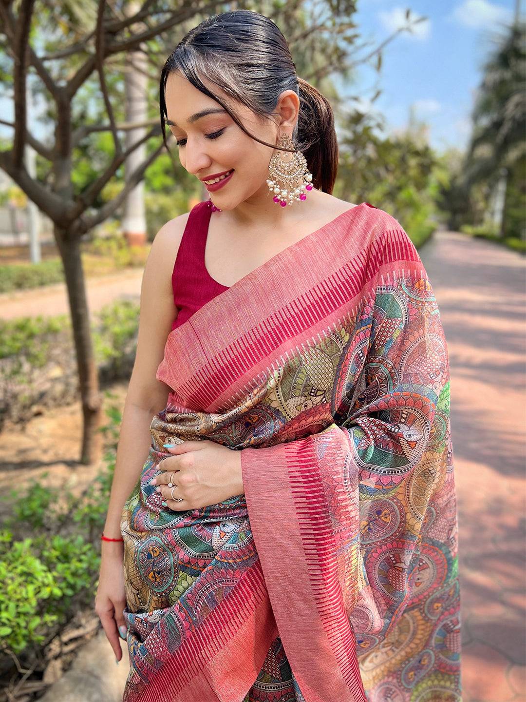 Close-up of Madhubani Kalamkari saree with vibrant patterns