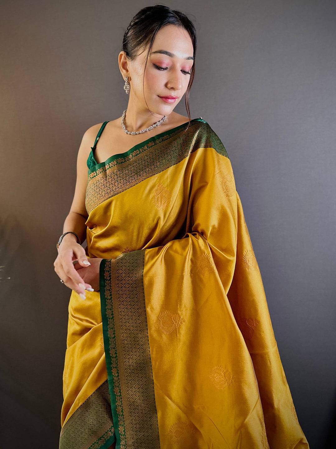 Elegant Yellow Silk Saree With Gold Zari Motifs