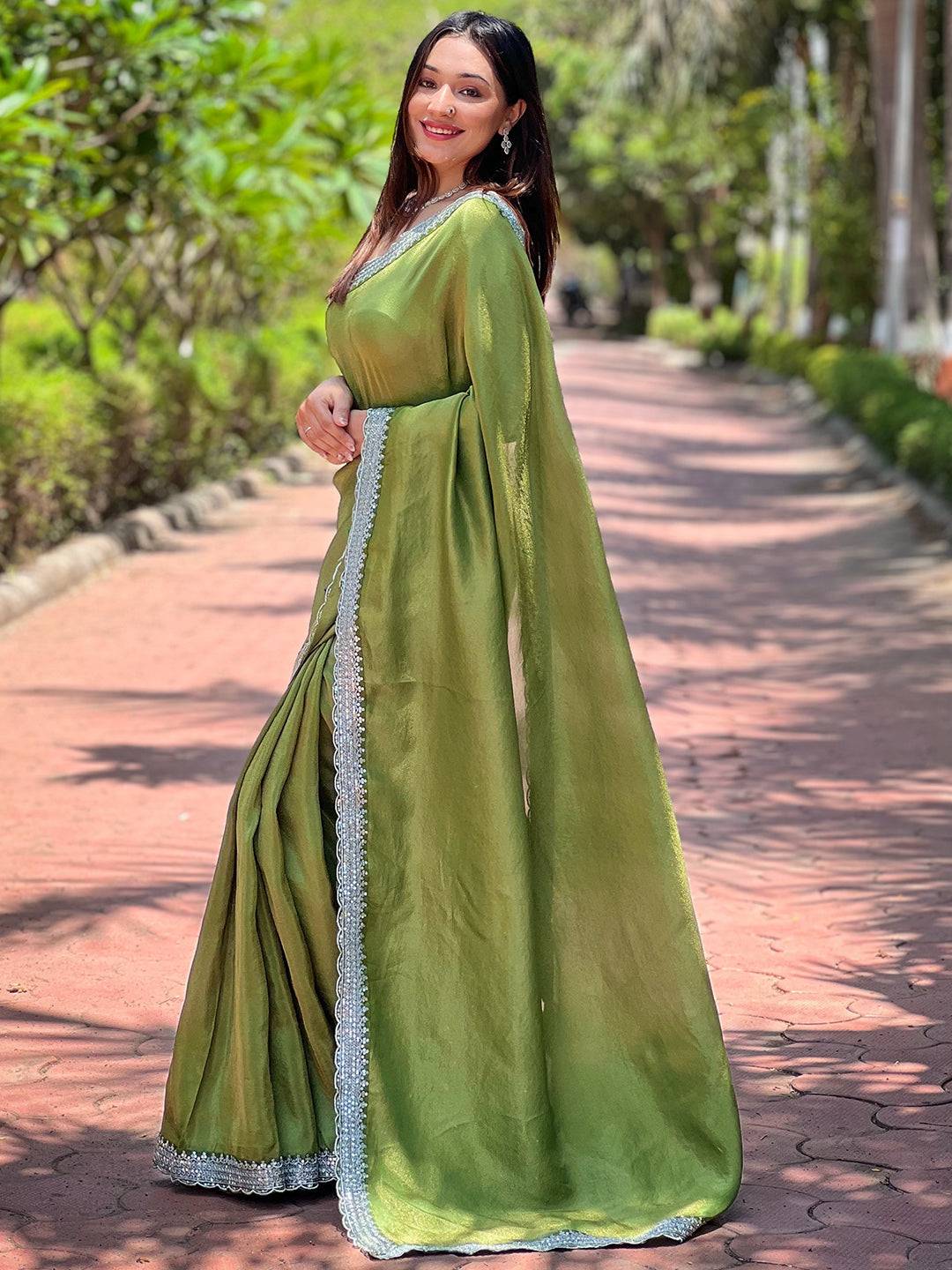 Stylish Forest Green Saree with Detailed Silver Border