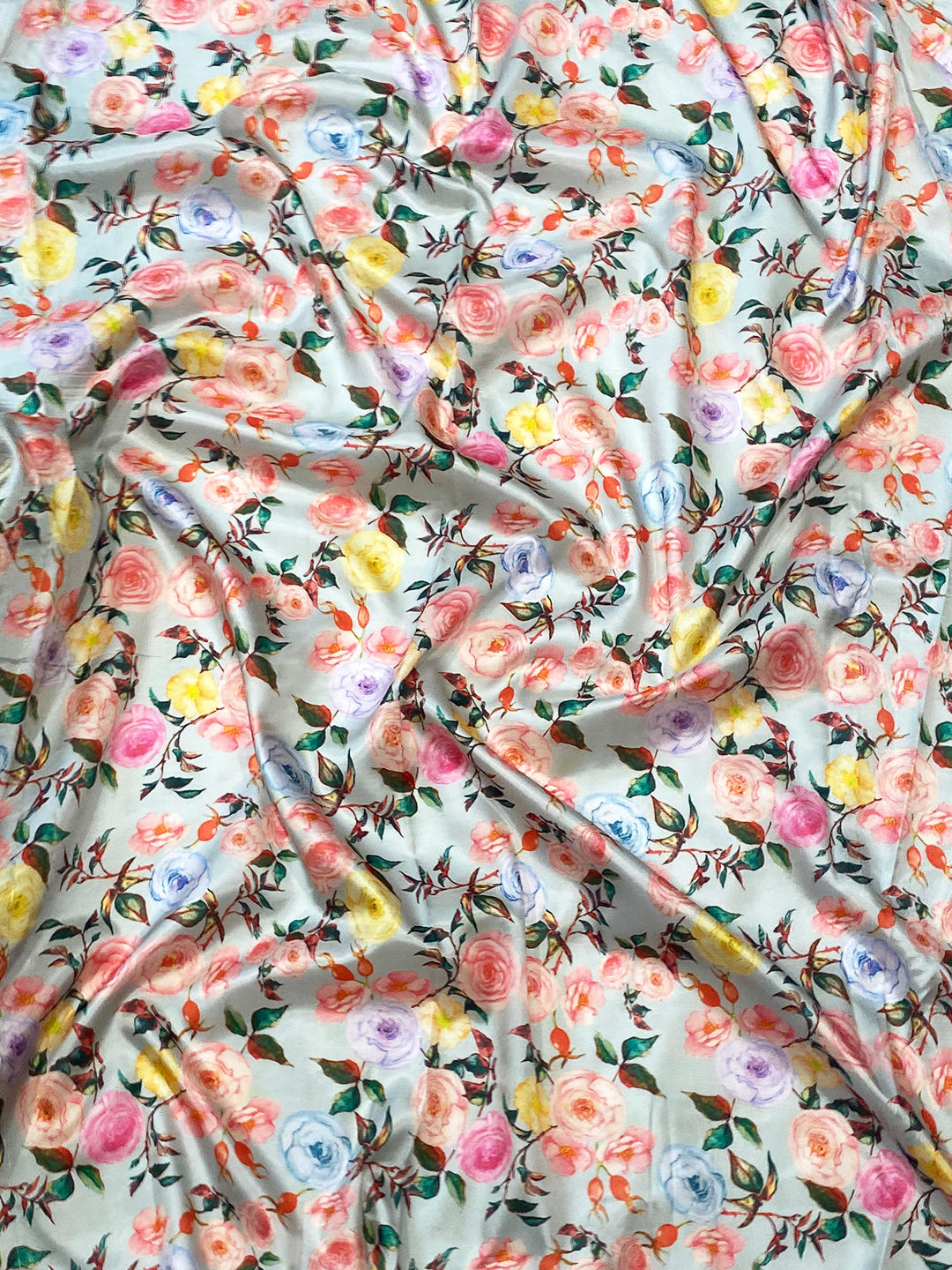 Close-up of floral print fabric on a Kanjivaram saree.