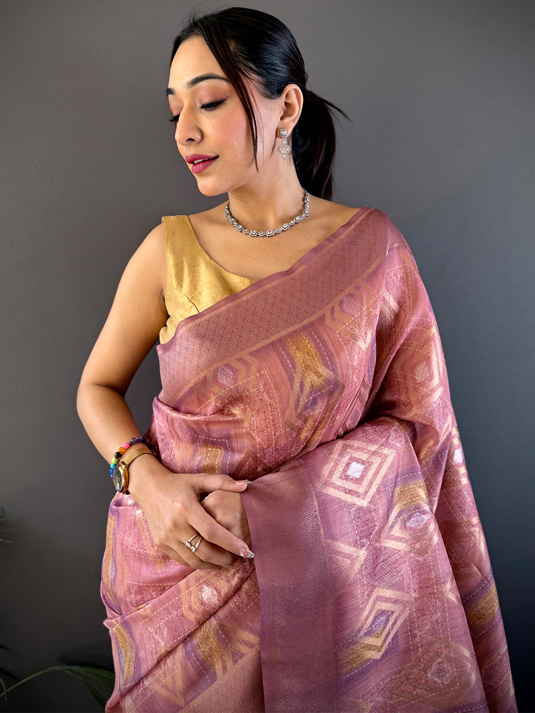 Blush Pink Banarasi Silk Katan Geometric Saree with intricate woven patterns, draped elegantly. Perfect for weddings and festive occasions.