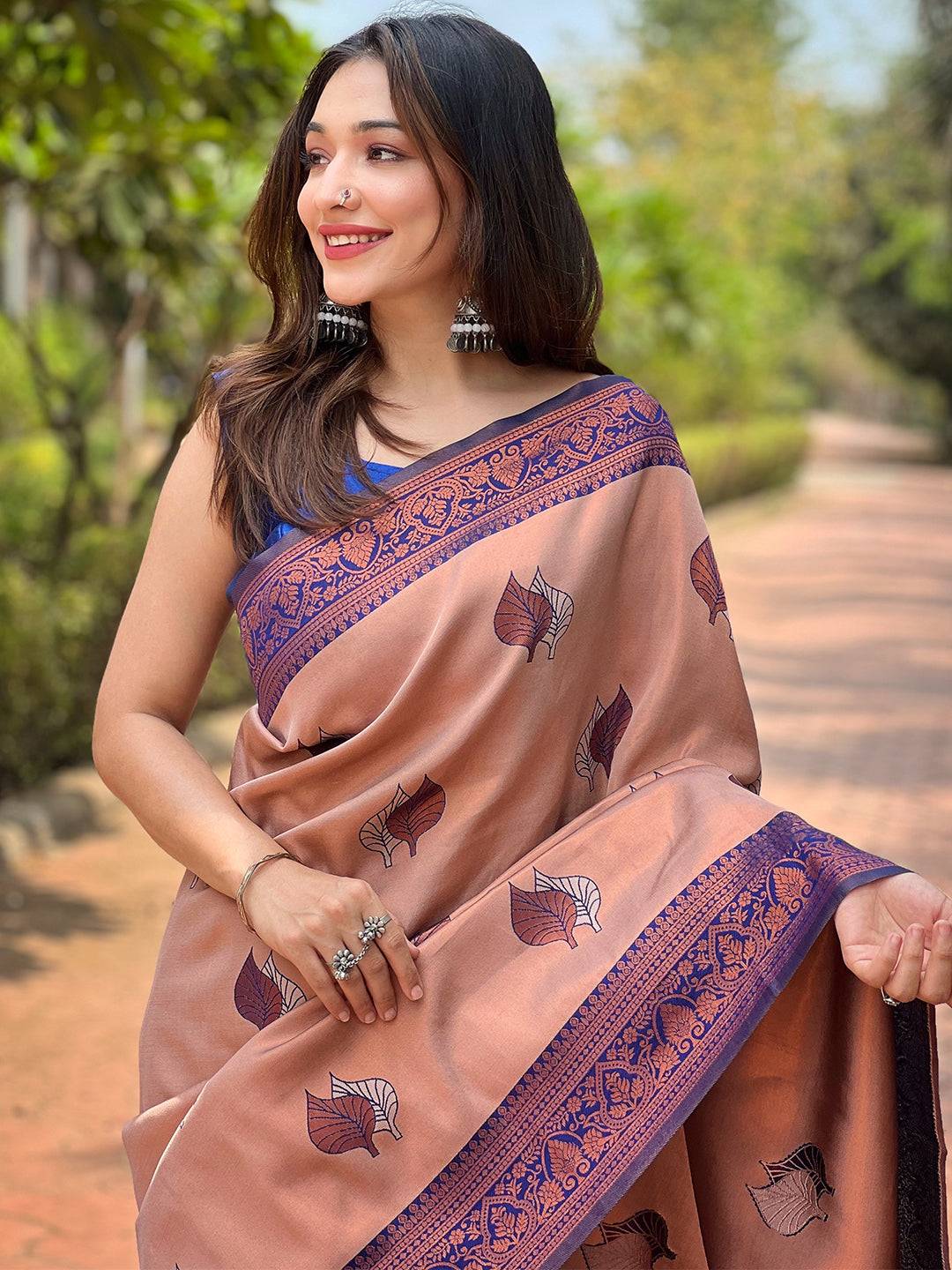 Pastel Peach Kanjivaram Tissue Saree With Gold Zari Weaving