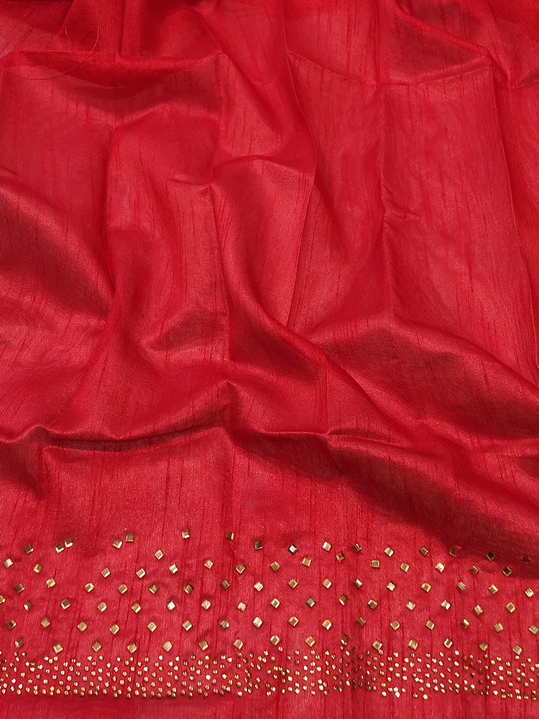 Red fabric detail with Swarovski Stones from Black Saree