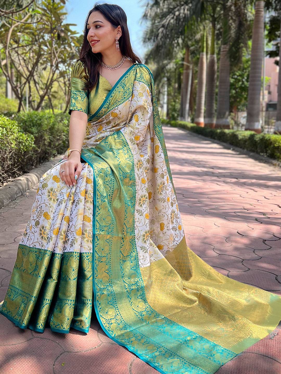 Elegant Banarasi saree with intricate green and gold design