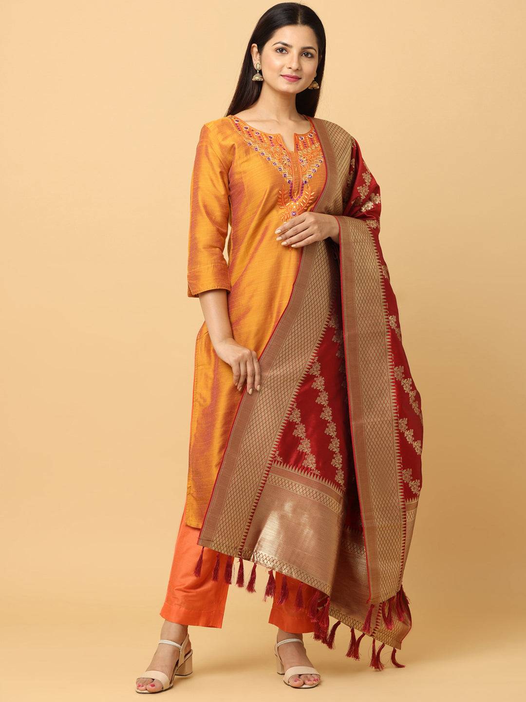 Model wearing red woven design dupatta