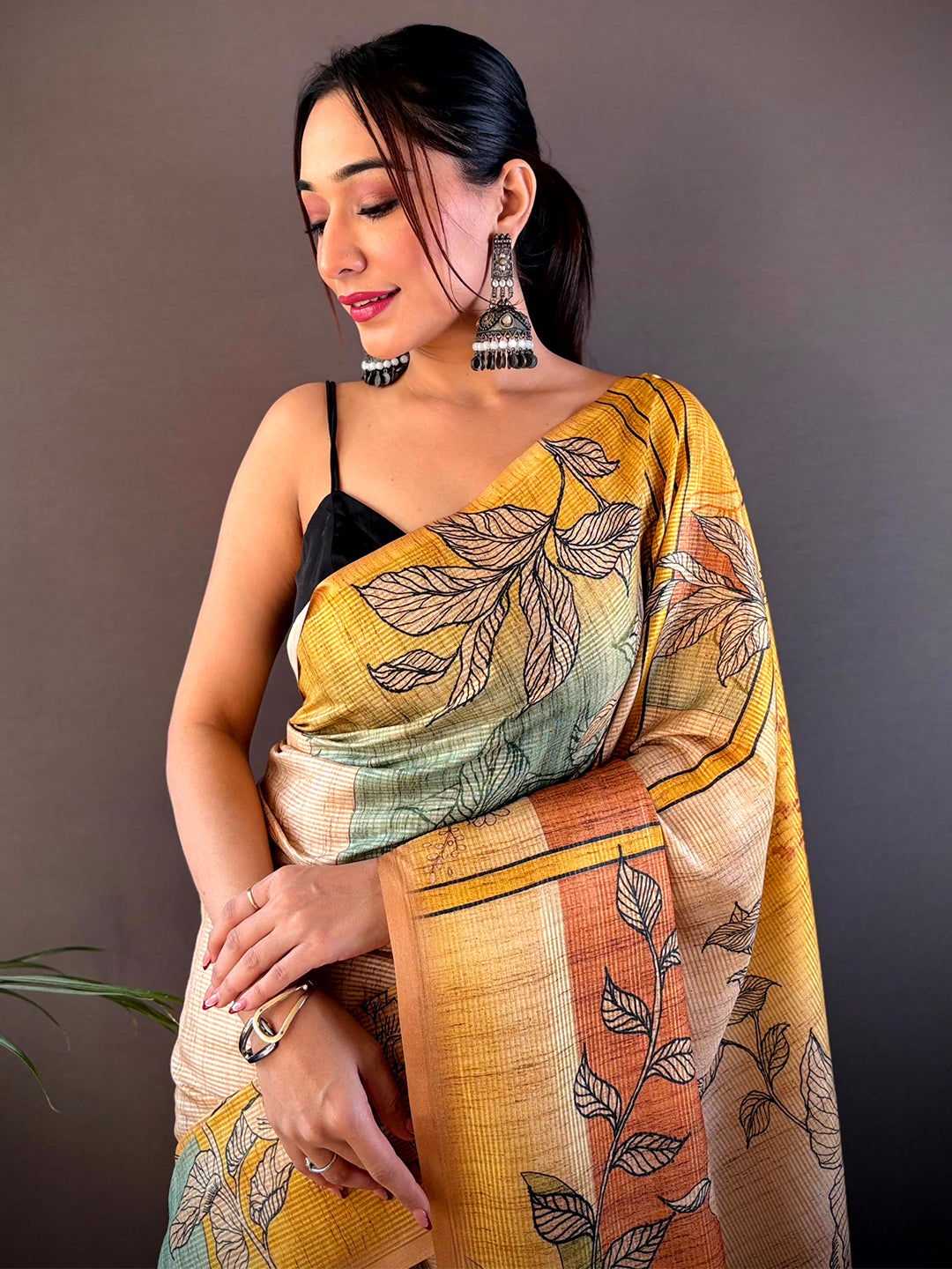 Yellow Abstract Floral Zari Tussar Saree with leaf design