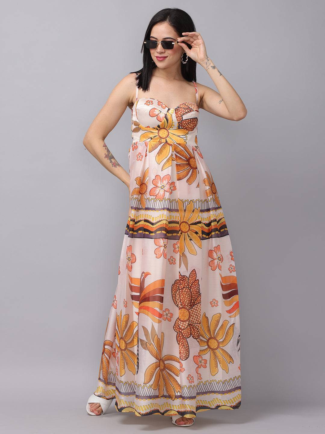 Off white chiffon print dress with floral design, model wearing sunglasses