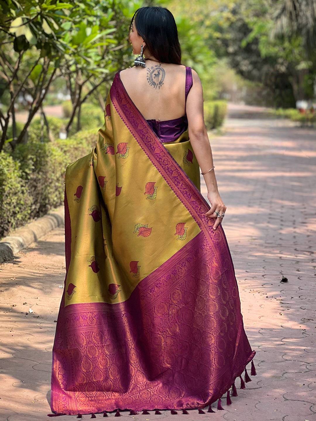 Back view of Kanjivaram saree showcasing gold zari design