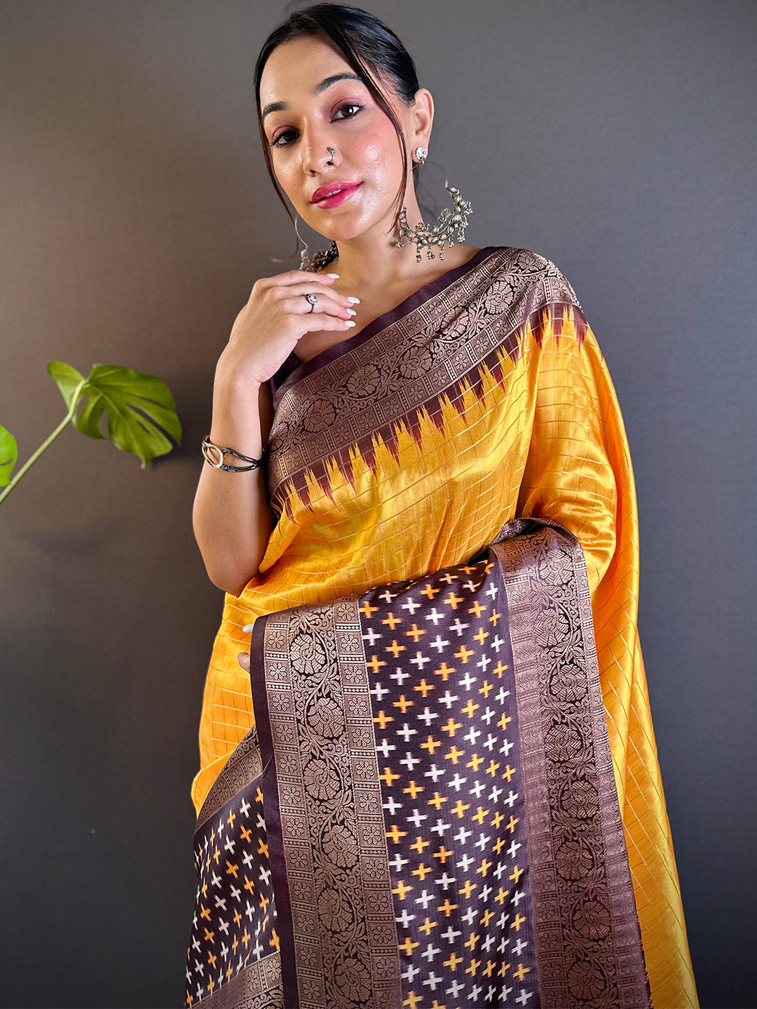 Yellow Chex Ikkat saree with intricate double border