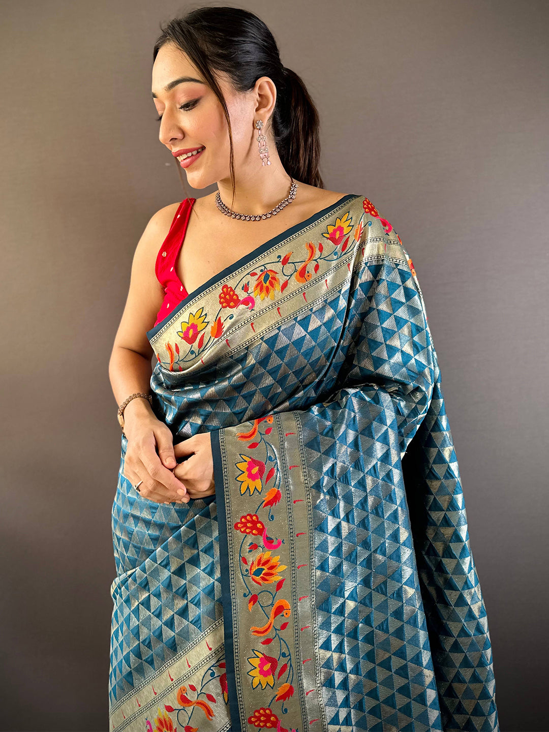 Denim silk blend Paithani saree with zari work and floral border