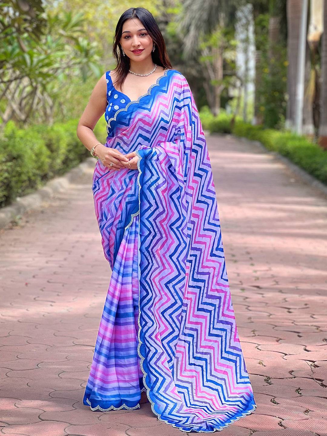 Model showcasing Leheriya and striped print saree outdoors