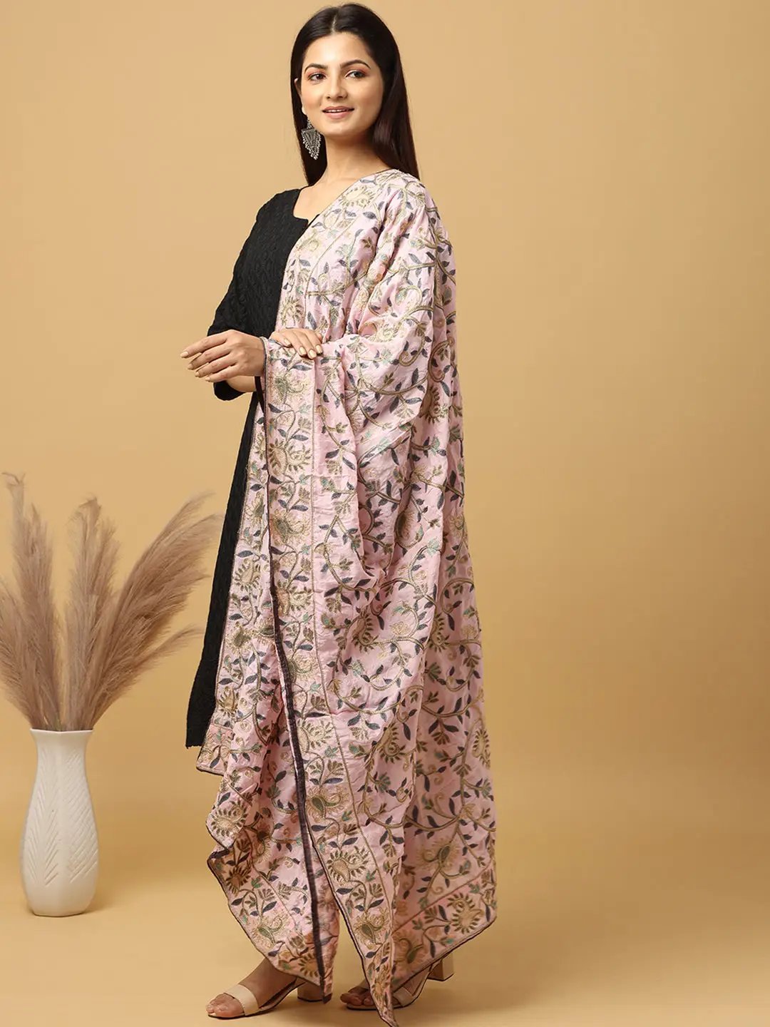 Side view of pink chiffon dupatta with detailed motifs