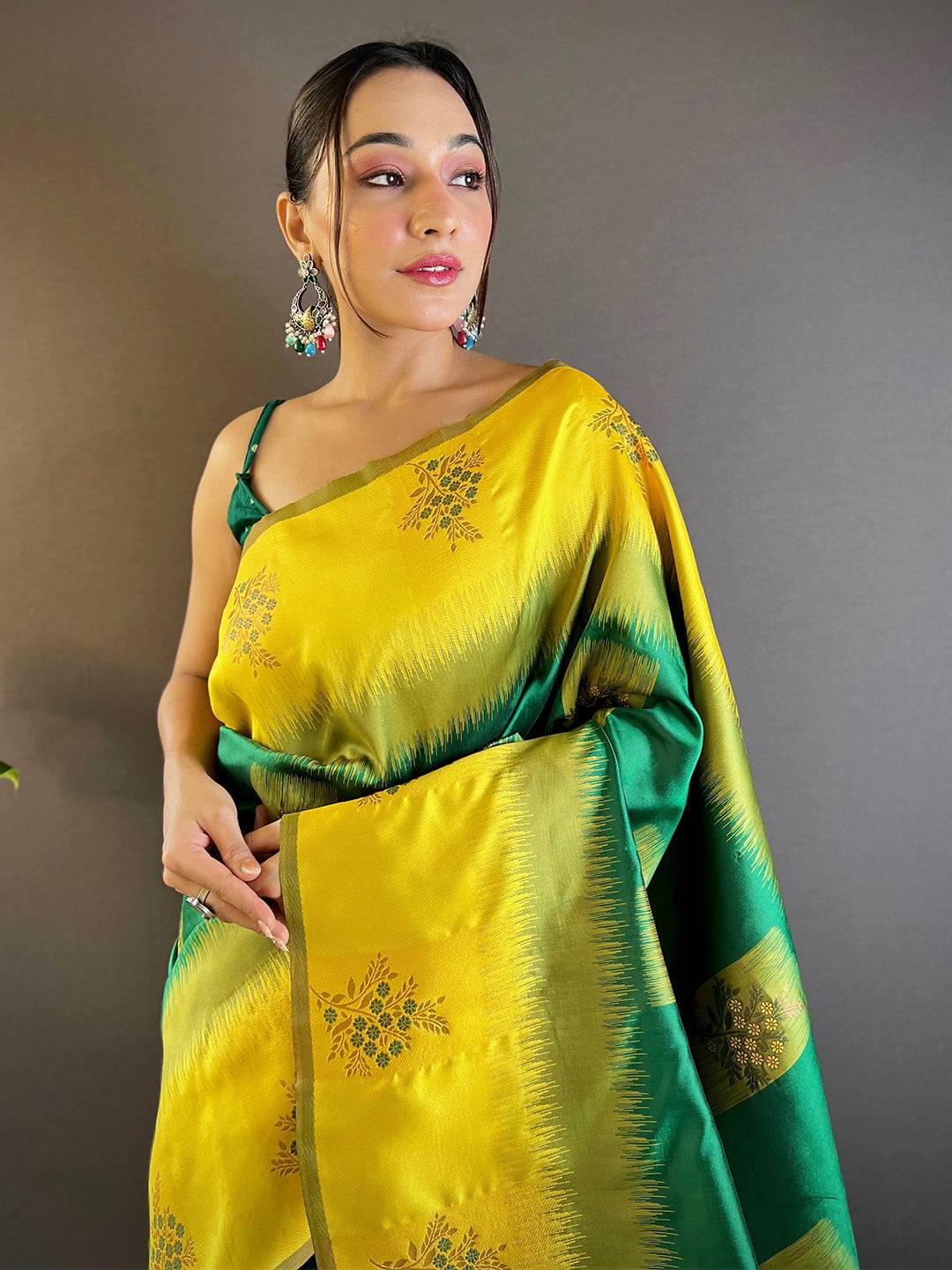 Model wearing dark green Sami Banarasi Tussar silk saree