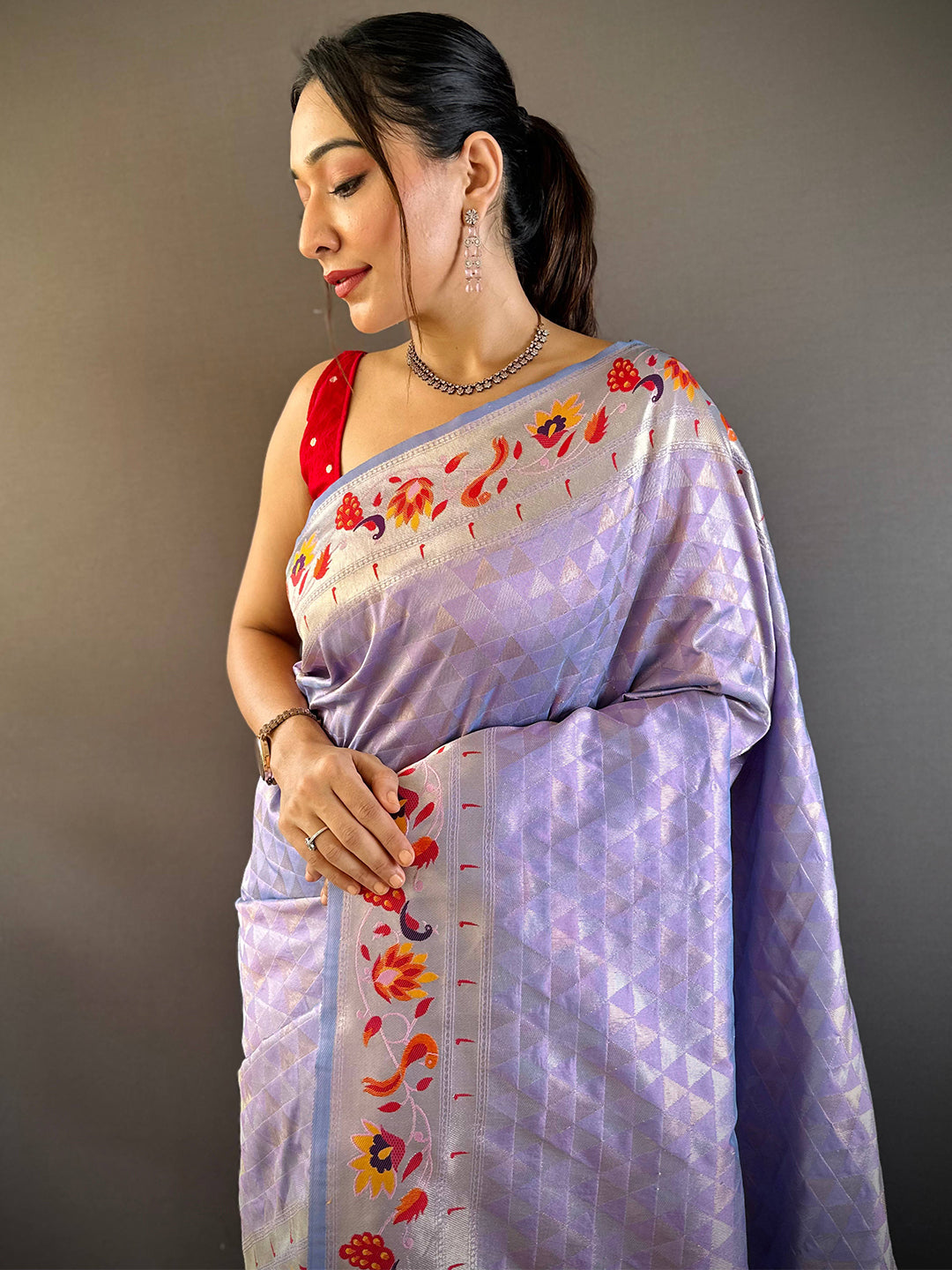 Lavender silk blend Paithani saree with floral zari work