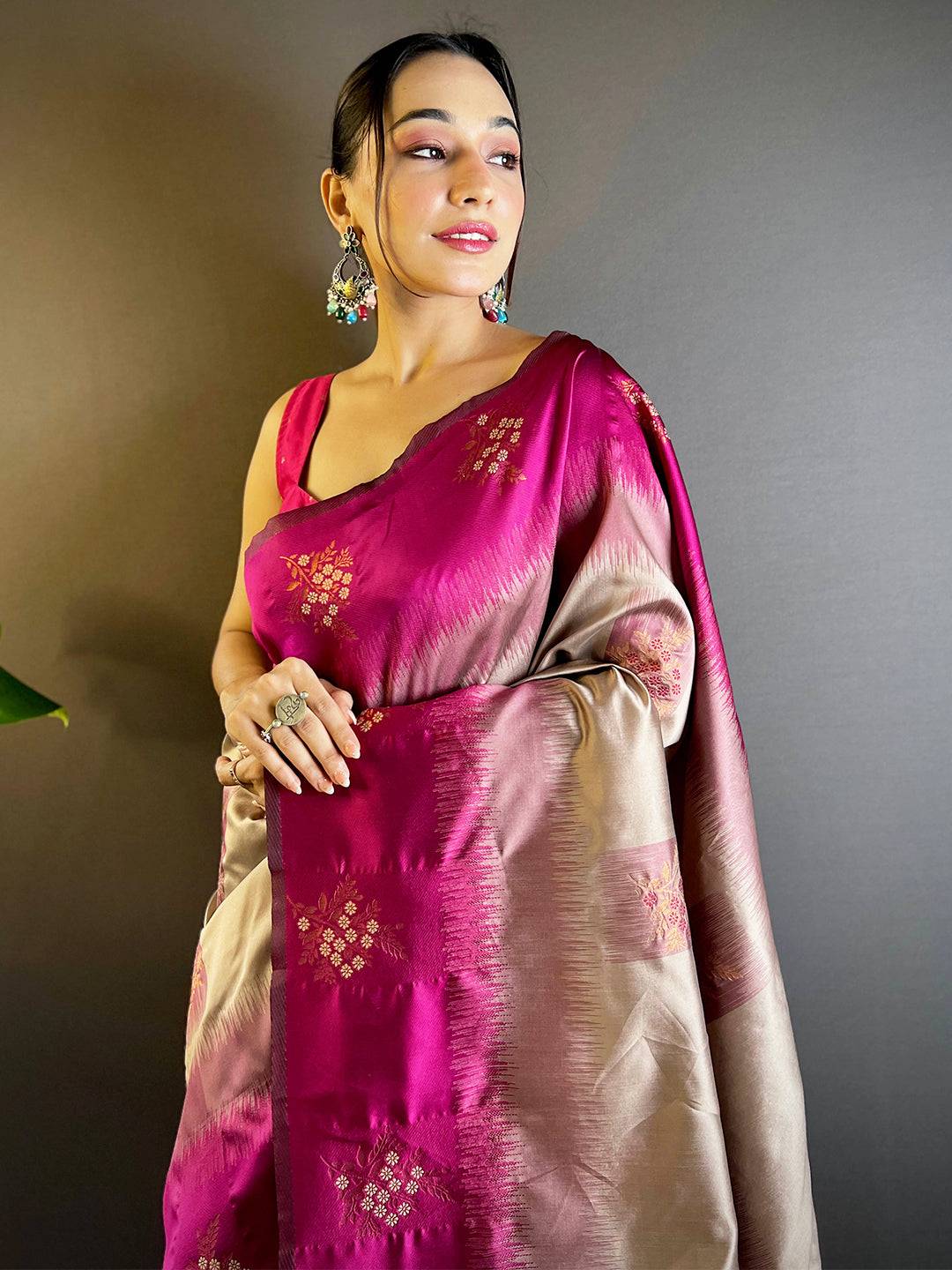 Elegant magenta Banarasi Tussar silk saree draped gracefully.