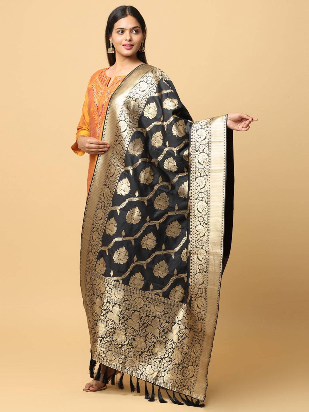 Sophisticated black silk blend dupatta with gold woven motifs.